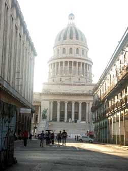 El Capitolio, or National Capitol Building in Havana, Cuba, was the seat of government in Cuba until after the Cuban Revolution in 1959, and is now home to the Cuban Academy of Sciences. Its design and name recall the United States Capitol in Washington, D.C., but it is only superficially similar. Completed in 1929, it was the tallest building in Havana until the 1950s and houses the world's third largest indoor statue.