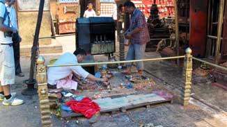 Men buring incense