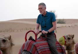 Happy on a camel