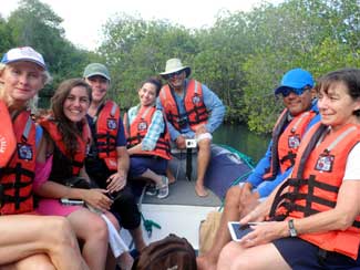 Shipmates in dingy on water